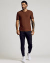 Cedar Active Short Sleeve Crew Neck Tee worn by a tattooed man.