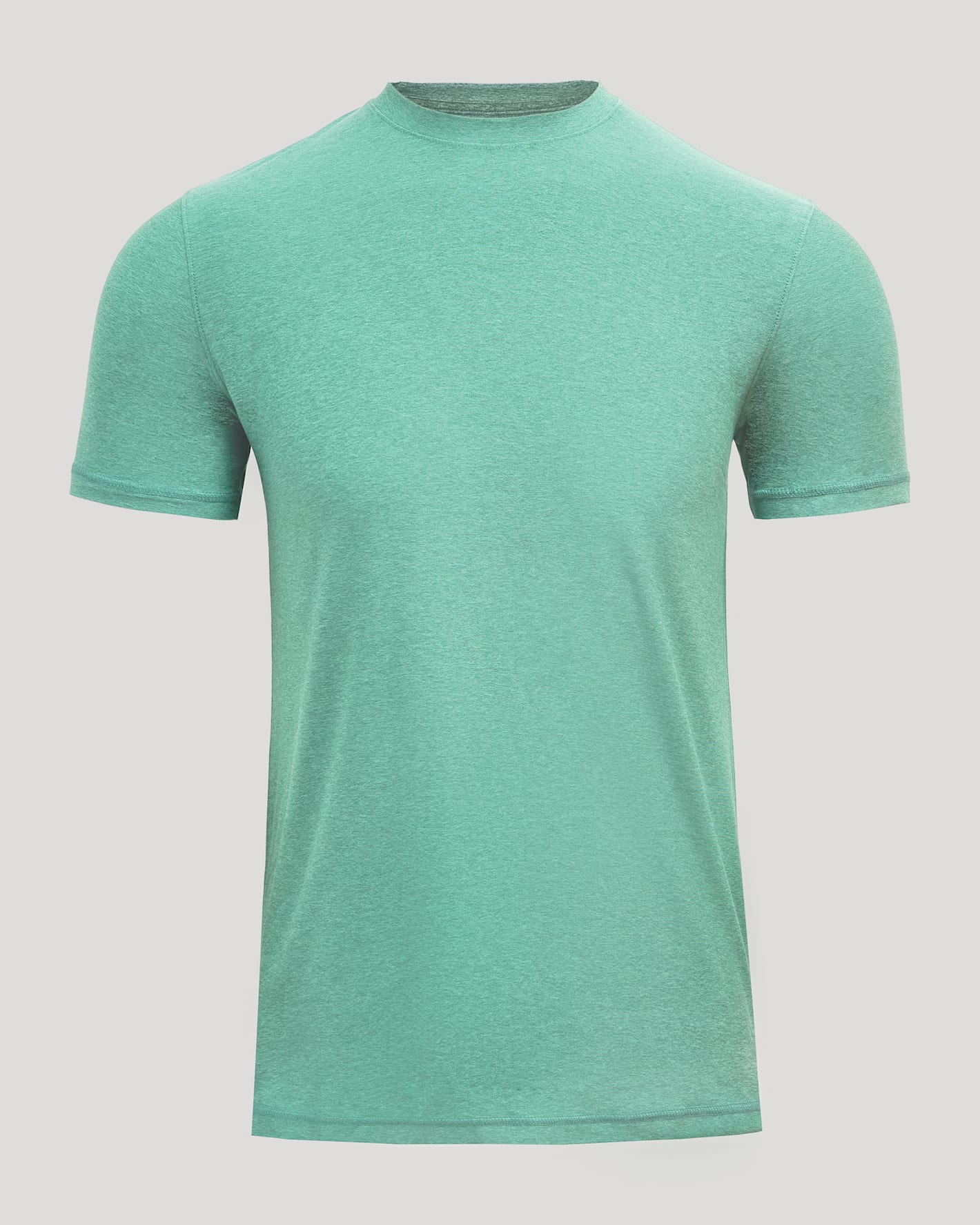 Green t-shirt on a light gray background