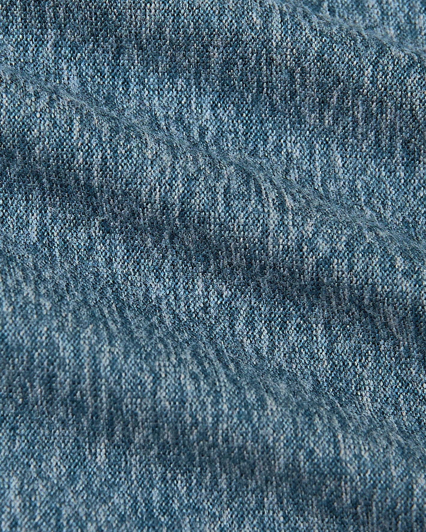 Heather Centurion Short Sleeve Active Crew Neck fabric, showcasing its textured weave.