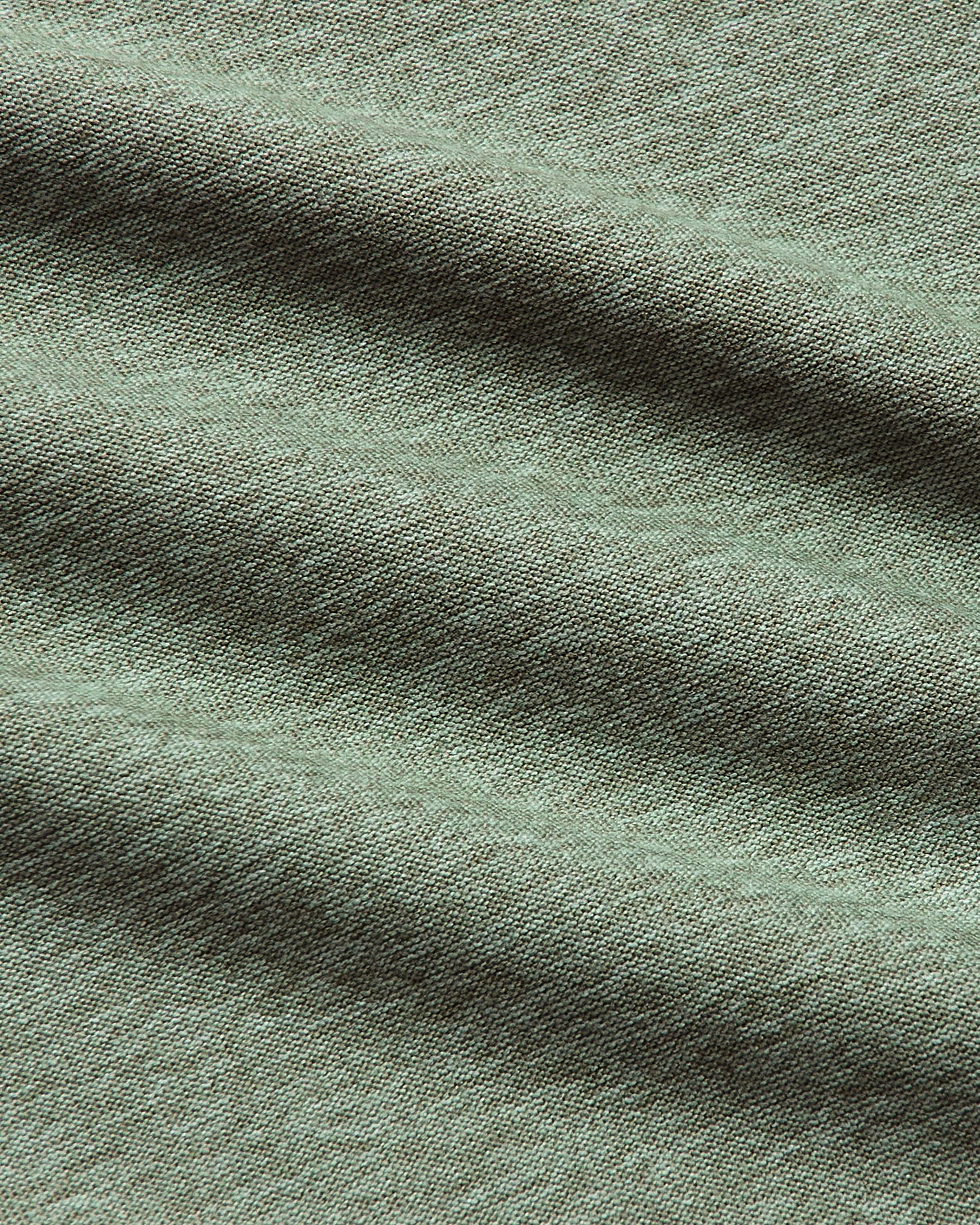 Heather Juniper Active Crew Neck Tee fabric close-up, showcasing its textured weave.