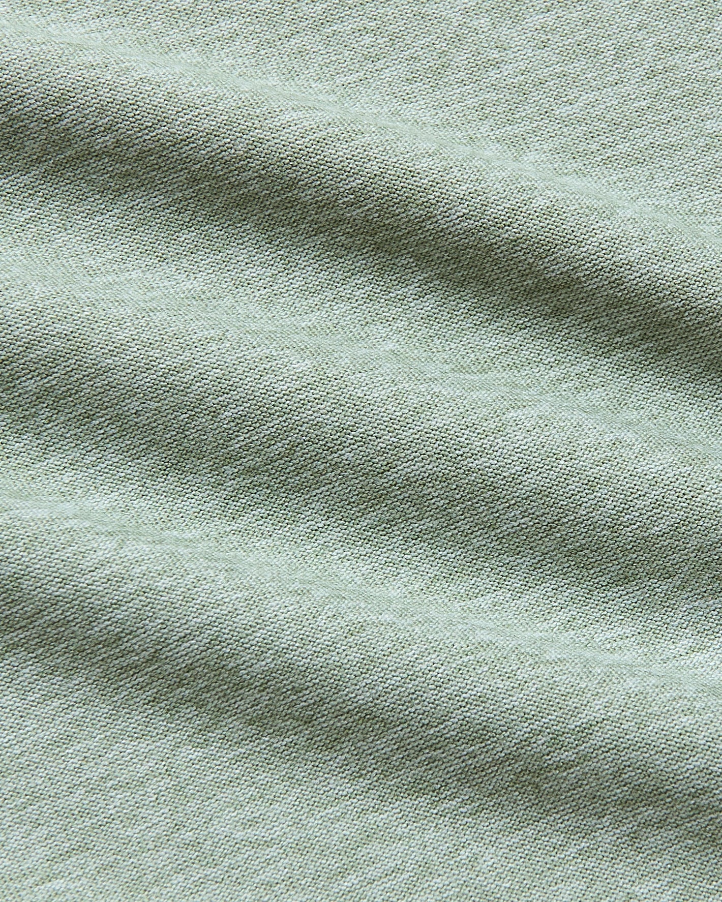Lichen Active Crew Neck Tee, close-up of stretchy, textured fabric.