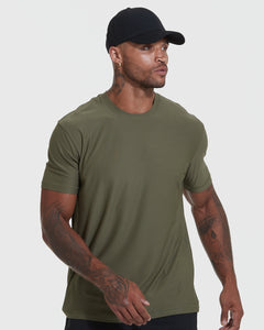 True ClassicModel wearing Pine Active Crew T-shirt in olive green, showcasing tattoos.