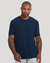 Man wearing Staple Active Crew 6-Pack navy T-shirt, light pants.
