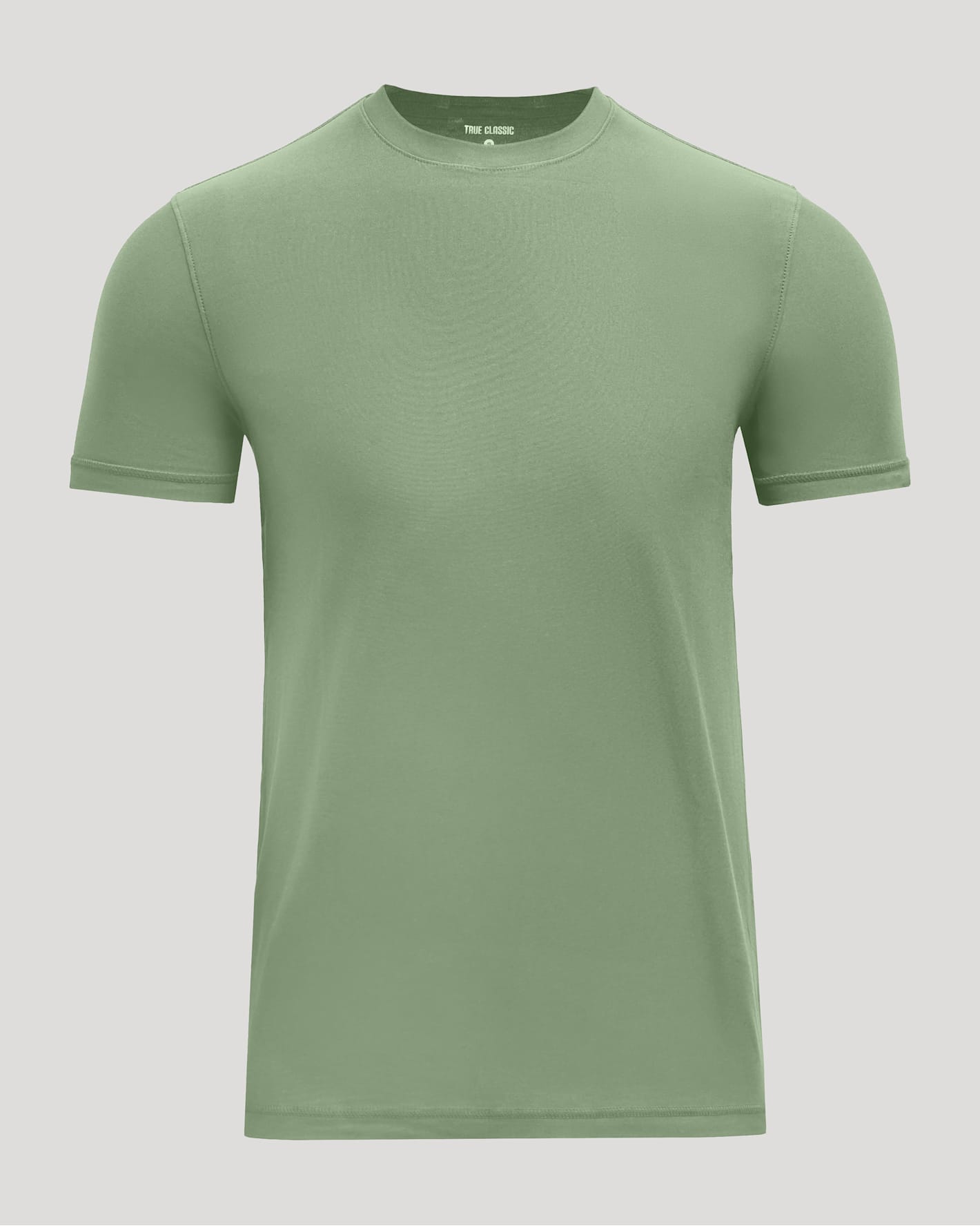 Green t-shirt on a light gray background