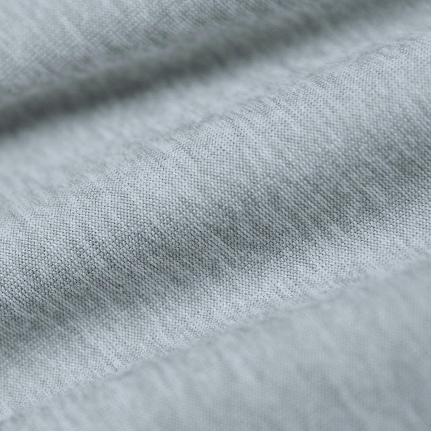 Light Heather Gray Active Polo 2.0 fabric close-up, showcasing fine weave.