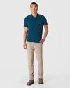 Man wearing Centurion Short Sleeve Sweater Polo with chinos and ankle boots.