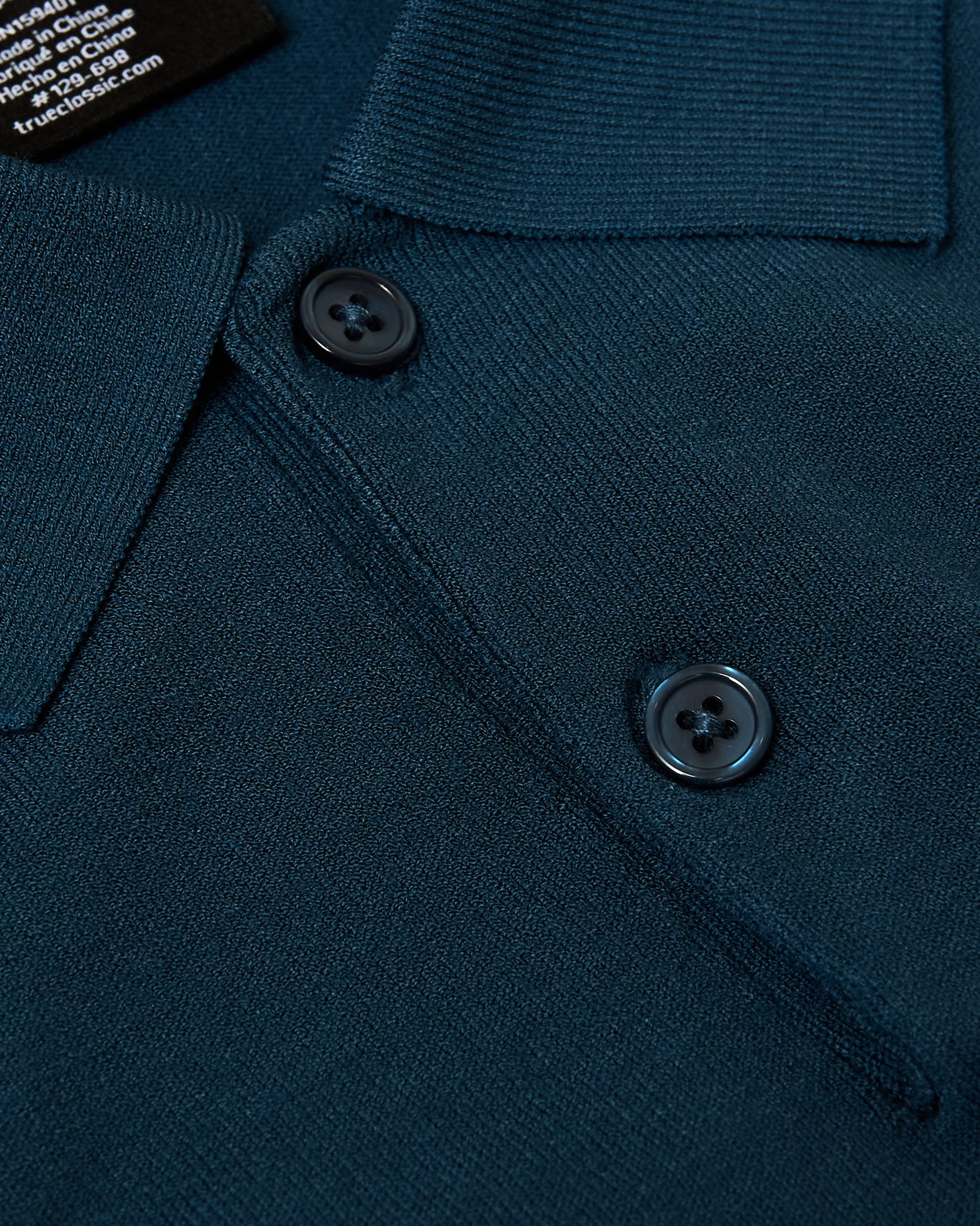 Centurion Short Sleeve Sweater Polo with ribbed collar and button placket.