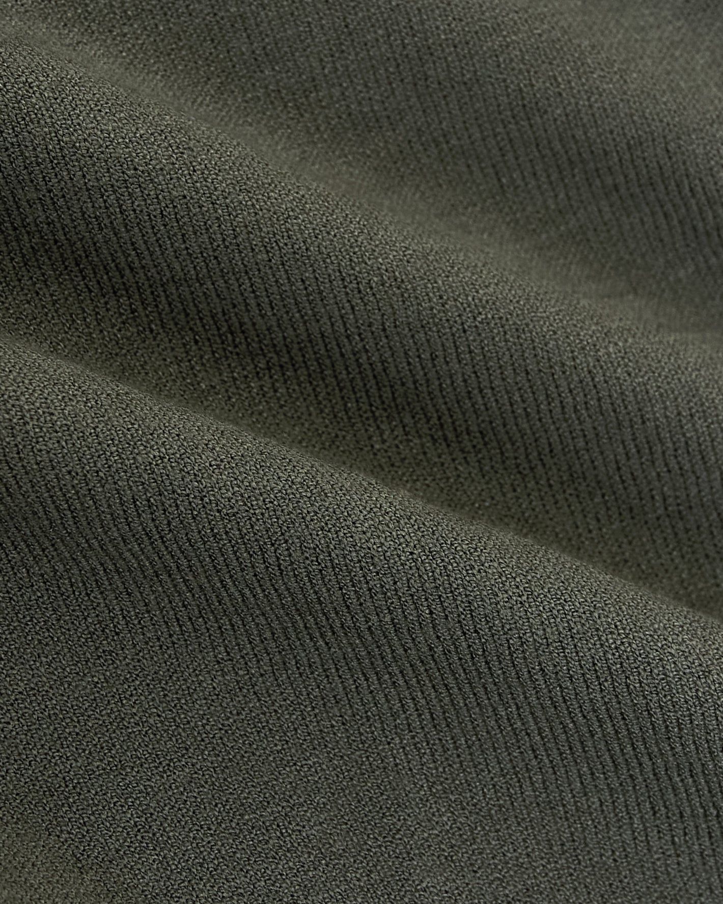 Moss Short Sleeve Sweater Polo with olive-green knit texture.
