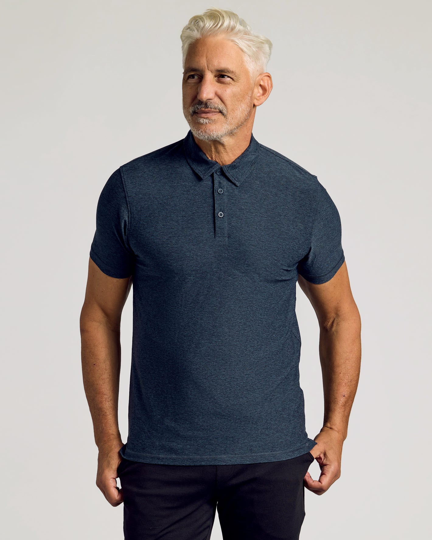 Middle-aged man modeling True Classic Men’s Active Short Sleeve Polo.