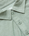 Lichen Active Polo 2.0, close-up of collar and buttons.