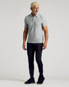Light Heather Gray Active Polo 2.0 on man with black joggers.