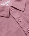 Quartz Rose Active Polo 2.0 close-up showing placket, collar, and buttons.