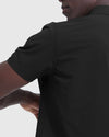 Person wearing Black & Carbon Commuter Short Sleeve Shirt 2-Pack, reaching back.