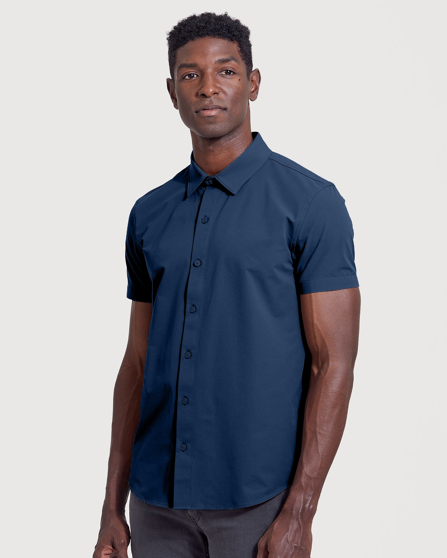Man wearing Timeless Short Sleeve Commuter Shirt in navy.