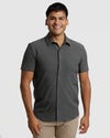 Gray Fiord Short Sleeve Ripstop Commuter Shirt worn by smiling man.