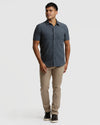 Model in Short Sleeve Ripstop Commuter Shirt, charcoal-grey, with khaki chinos.
