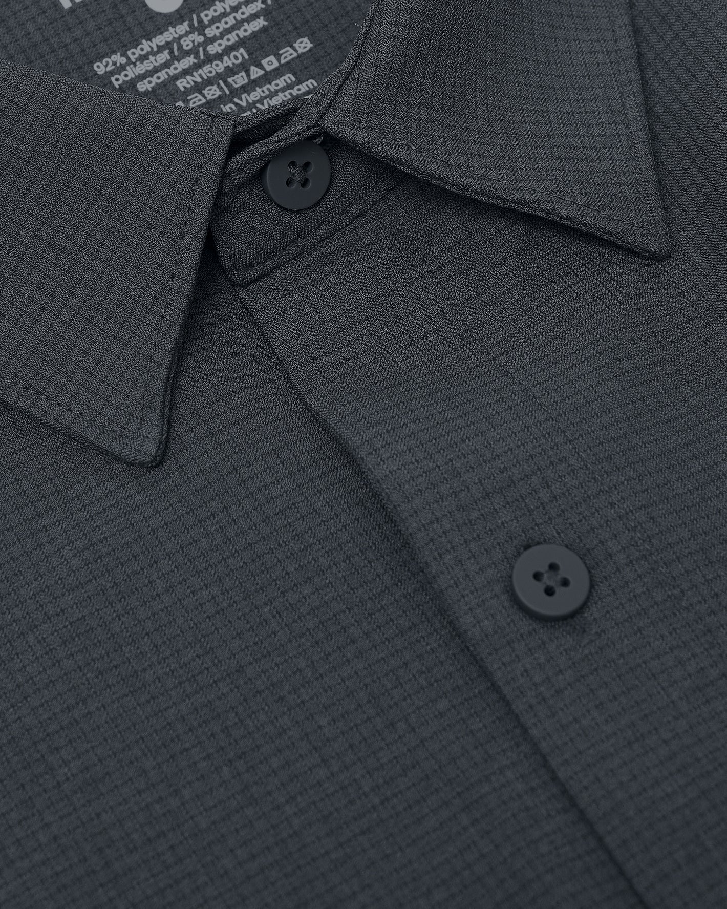 Heather Navy Short Sleeve Ripstop Commuter Shirt 1 collar and buttons close-up.