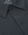 Short Sleeve Ripstop Commuter Shirt close-up, dark gray, waffle texture.