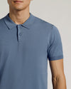 Fiord Dressy Polo on model, light-blue, short-sleeve, classic collar.