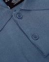 Fiord Dressy Polo close-up, showcasing knit fabric, placket, collar, and label.
