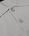 Heather Gray Dressy Polo's collar and placket with two buttons.