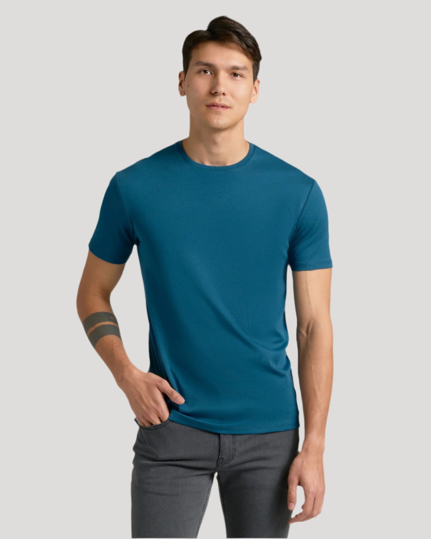 Young man models Navy & Lagoon Classic Premium Pima Crew 2-Pack.