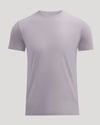 A short-sleeve crewneck t-shirt in a light lavender-gray color, displayed on a neutral light gray background.