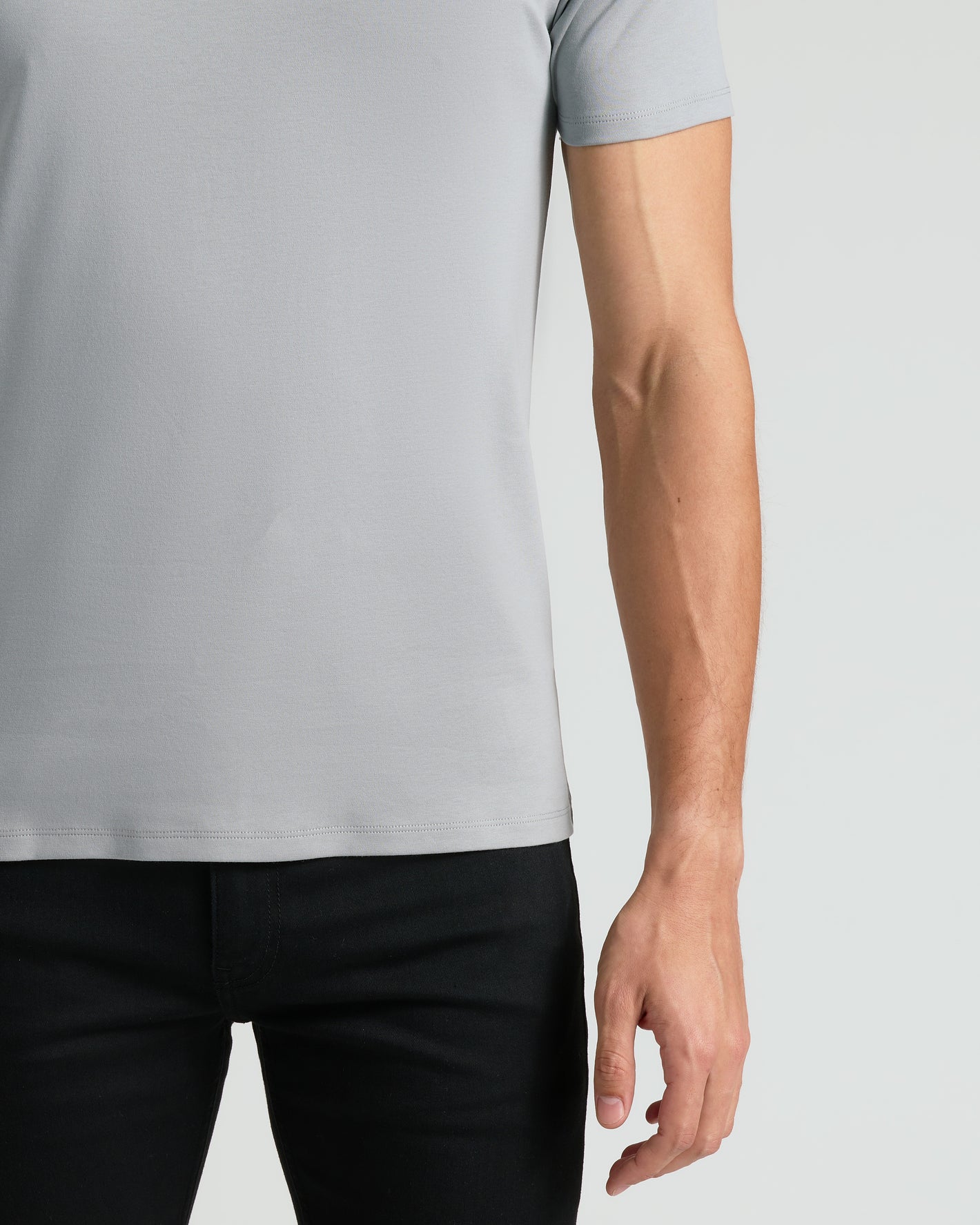 Premium Pima Crew 7-Pack: Light-gray T-shirt with slim-fit black pants.