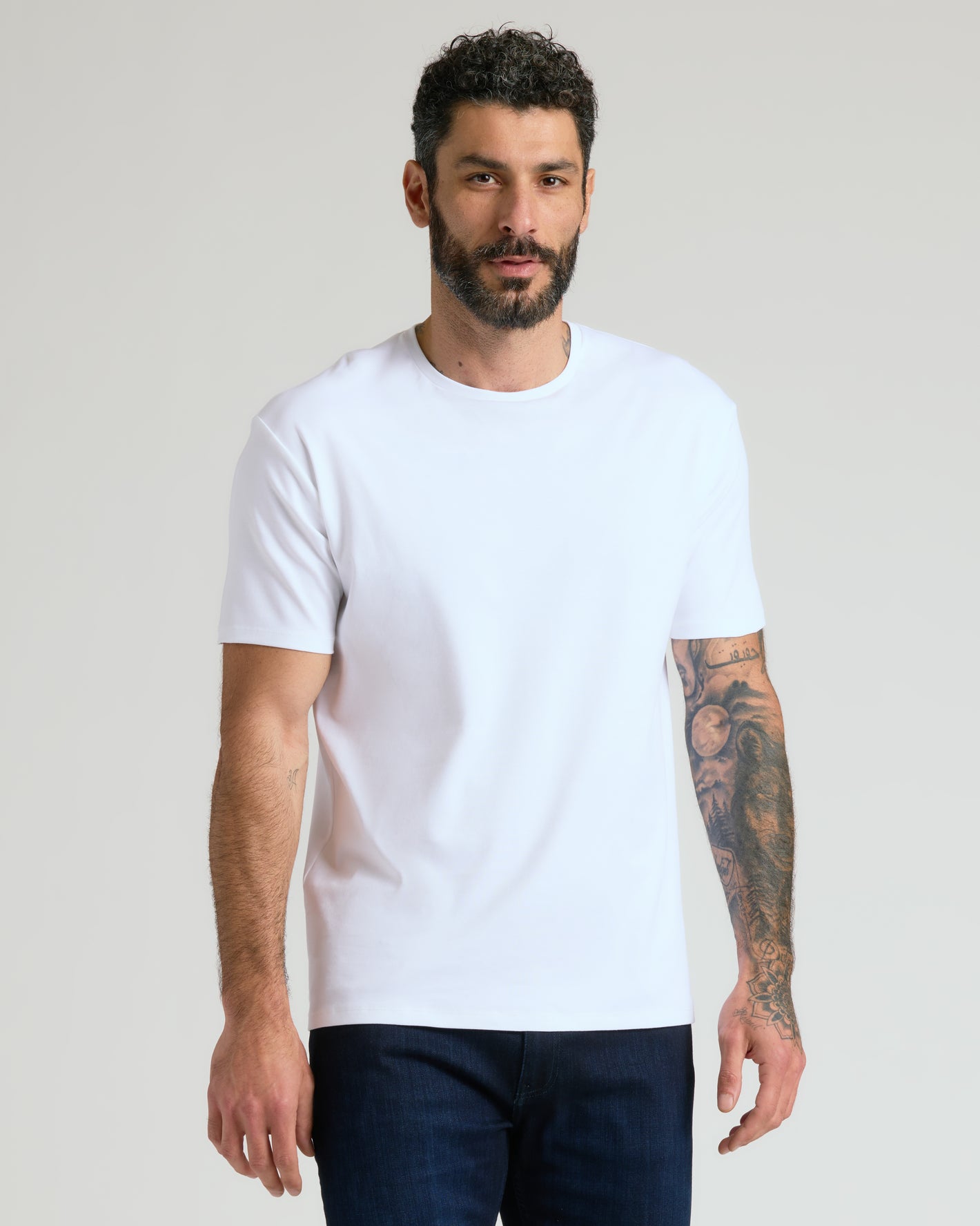 Man modeling Classic Premium Pima Crew 4-Pack T-shirt.