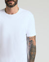 Premium Pima Crew 4-Pack Tee on model with tattoos visible.