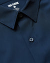Navy Performance Dress Shirt front yoke and collar detail.