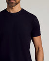 Man wearing Black Curved Hem Classic Crew Neck T-shirt.