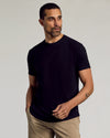 Man wearing Black Curved Hem Classic Crew Neck from 3-Pack, styled casually.