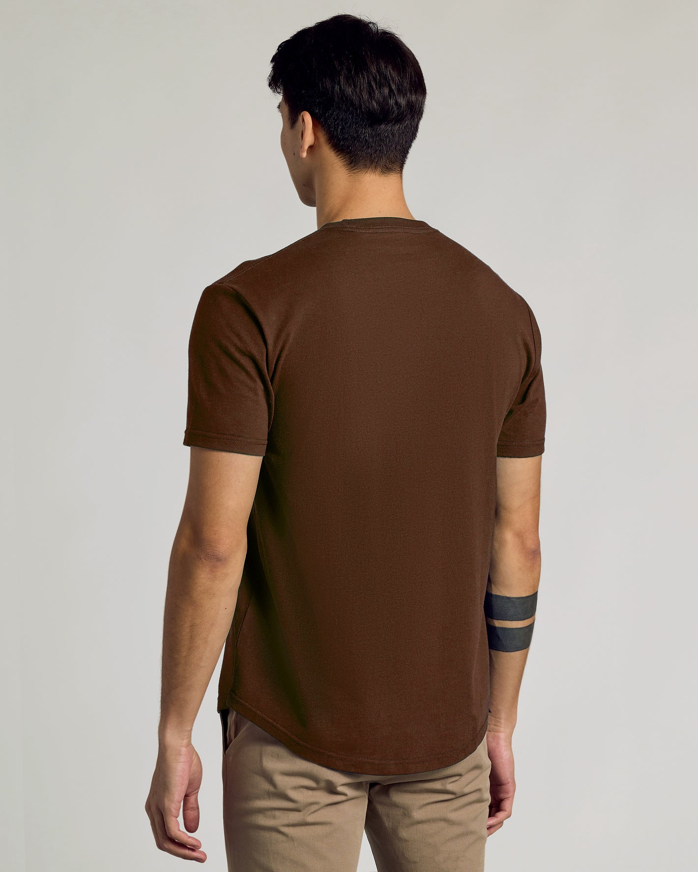 Back view of Seasonal Classic Curved Hem Crew in brown, short sleeves.