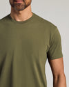 Man wearing Classic Curved Hem Crew 6-Pack T-shirt with tattoo visible.