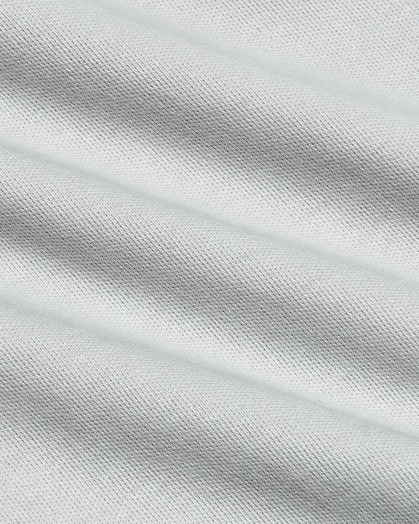 Close-up of Vapor Curved Hem Classic Crew Neck fabric texture.