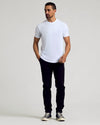 White Curved Hem Classic Crew Neck 6-Pack worn with black pants.