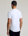 White Curved Hem Classic Crew Neck 3-Pack on model, showcasing snug fit.
