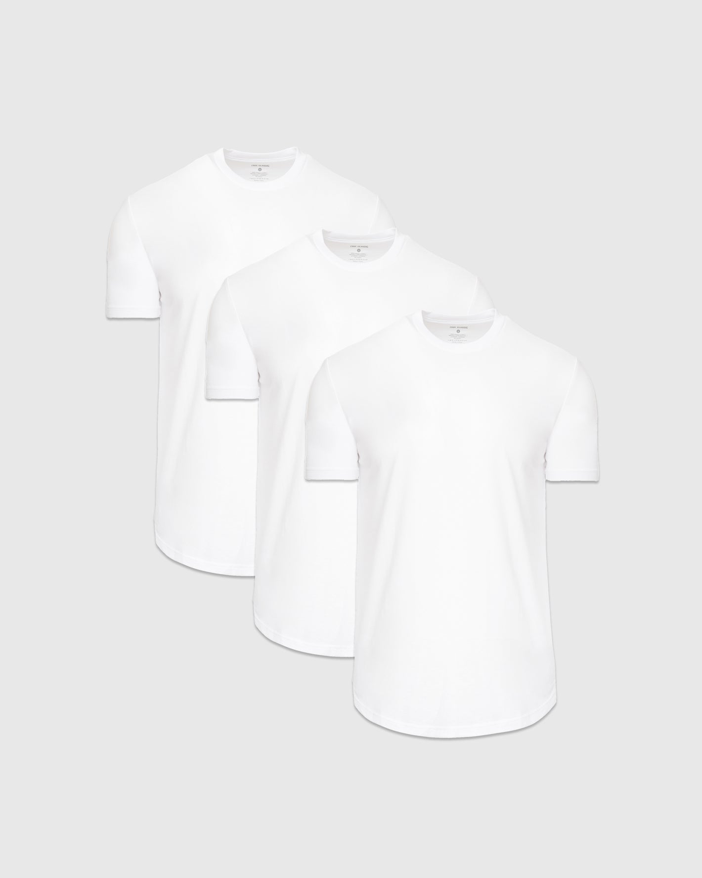 White Curved Hem Classic Crew Neck 3-Pack arranged on light gray background.