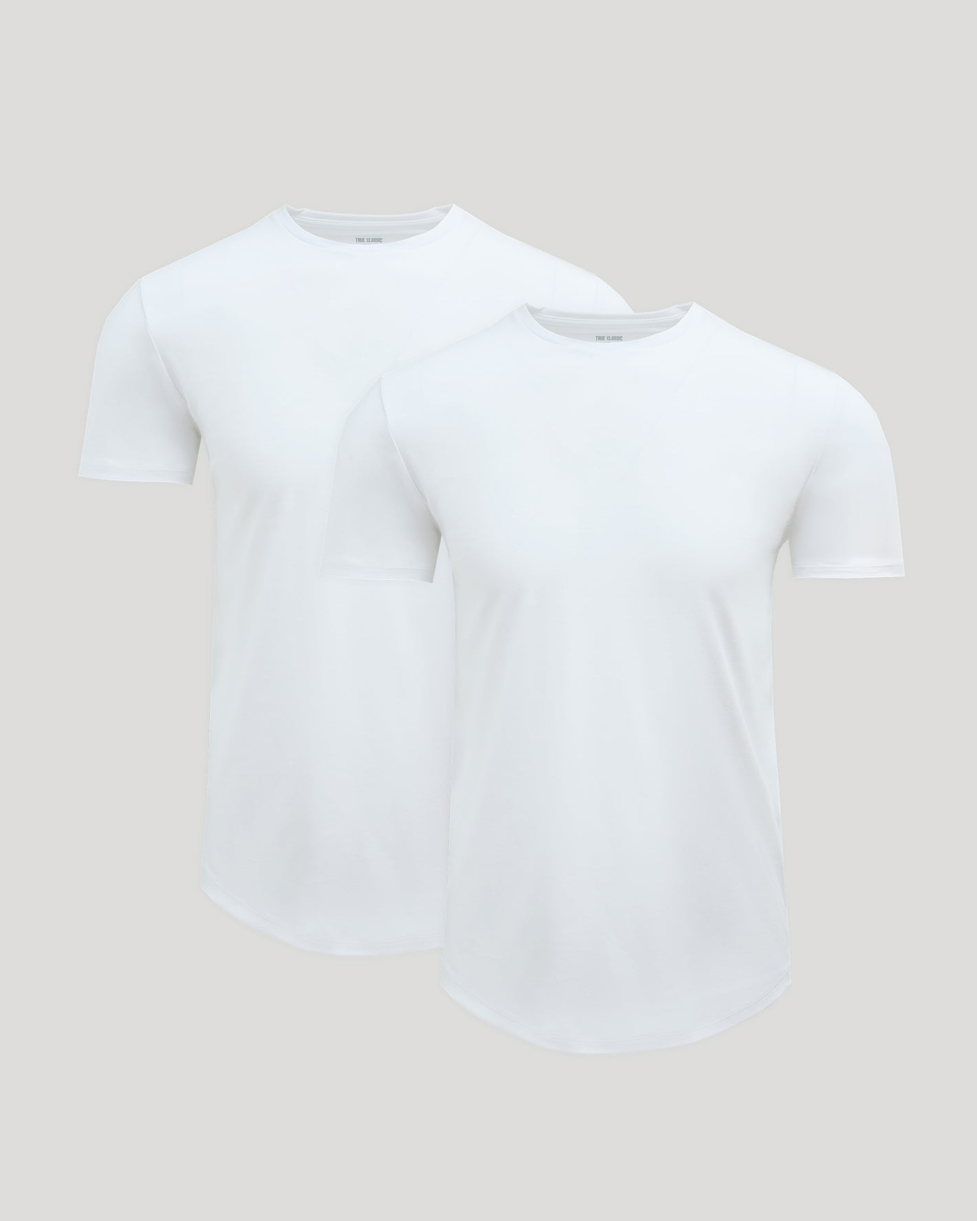 True Classic Men’s Pima Cotton Blend Crew, modern curved hem, athletic fit.
