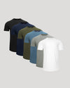 Six short-sleeve colorblock t-shirts in different colors (black, navy, olive green, light blue, heather gray, and white) arranged in a diagonal row on a light gray background.