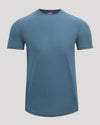 A short-sleeve crewneck t-shirt in a muted slate blue color, displayed on a clean, light gray background.