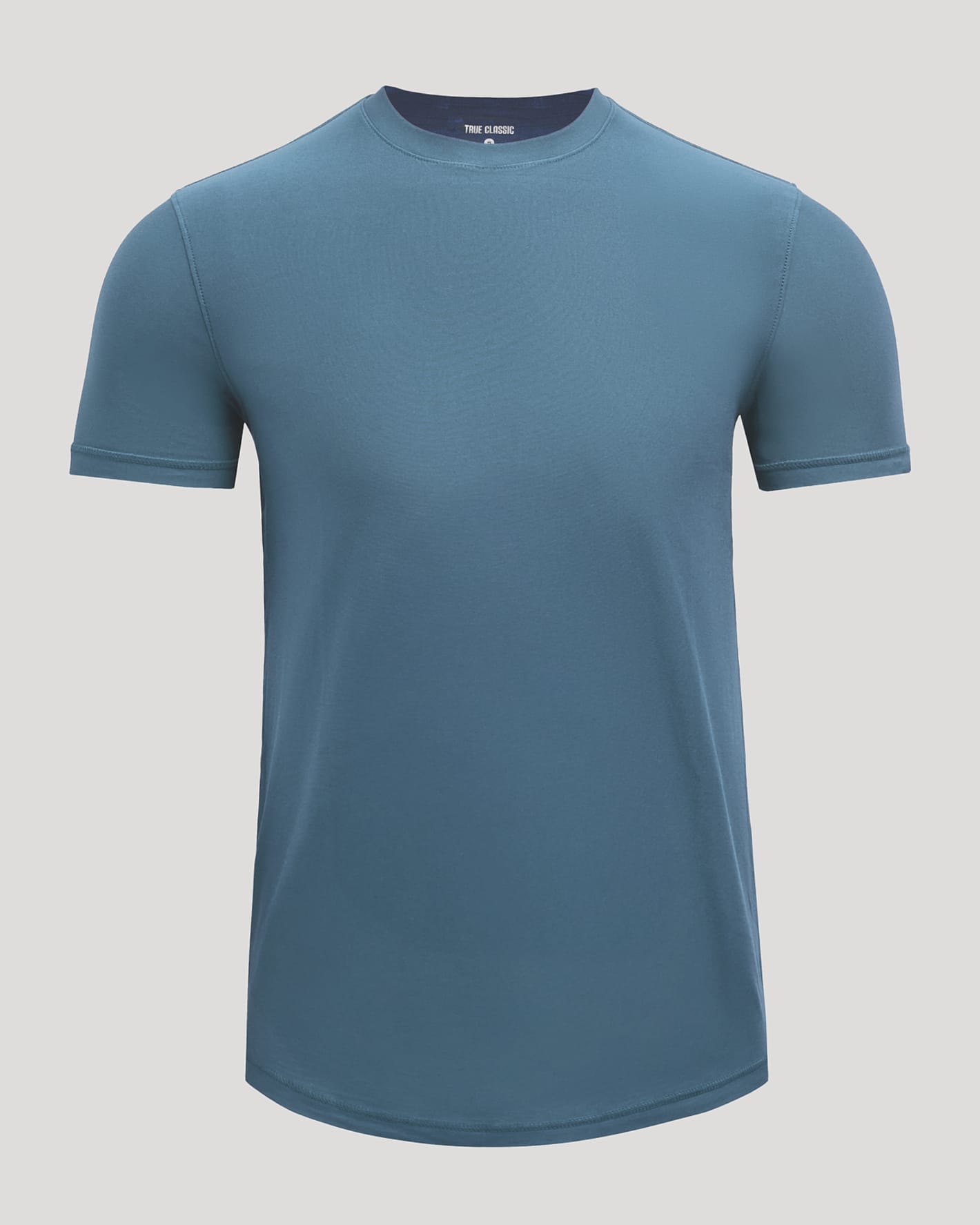 A short-sleeve crewneck t-shirt in a muted slate blue color, displayed on a clean, light gray background.