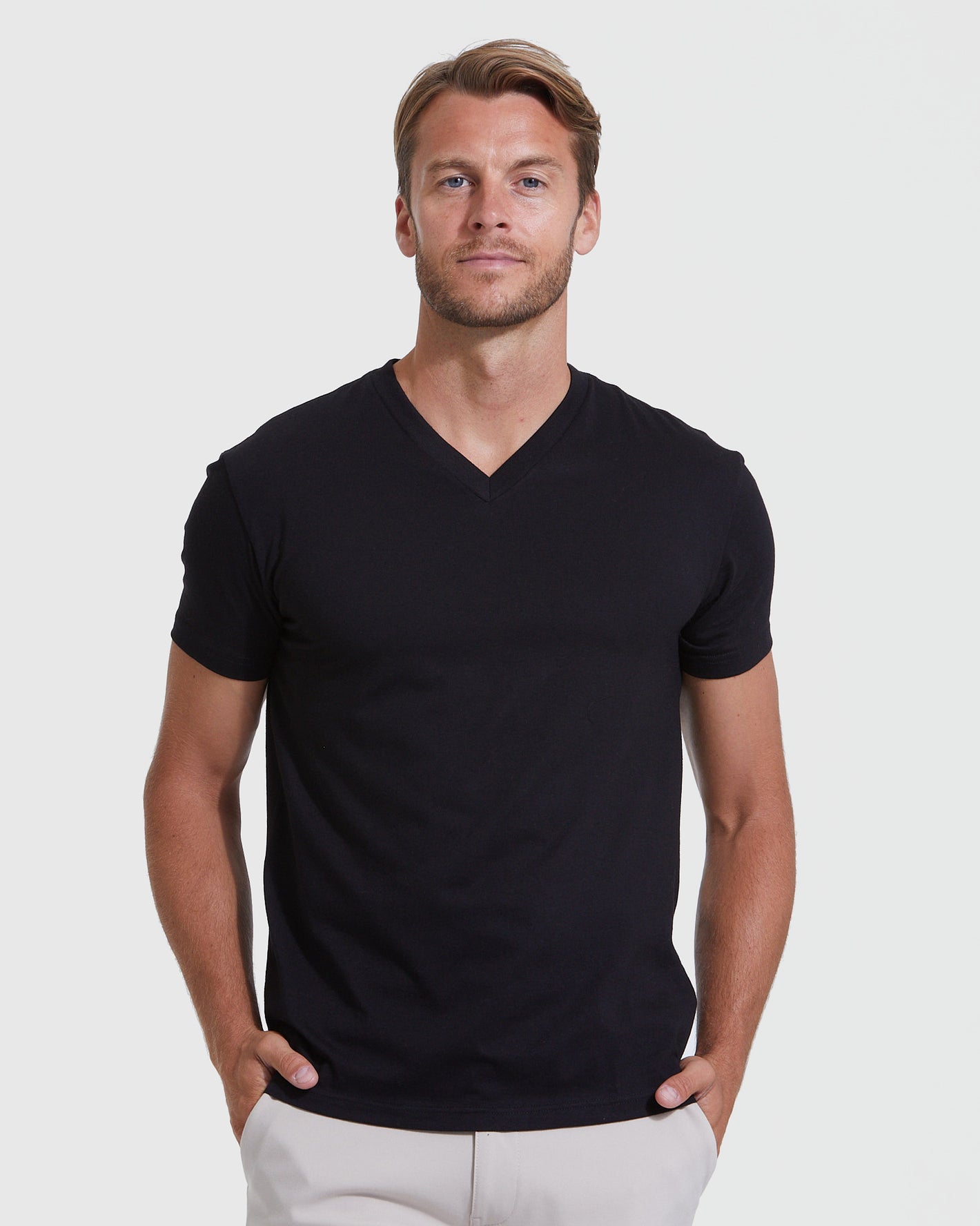 Man wearing black V-neck from Try 1 of Everything 4-Pack.