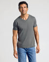 Man wearing Staple Classic V-Neck 10-Pack, charcoal-gray, relaxed posture.