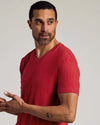 Man wearing Dark Heather Lava Classic V-Neck, showcasing fit and comfort.