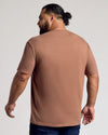 Man wearing Dark Heather Sepia Classic V-Neck and dark jeans, back view.