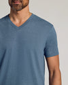 Man wearing Dark Heather Tempest Classic V-Neck, emphasizing fit and comfort.