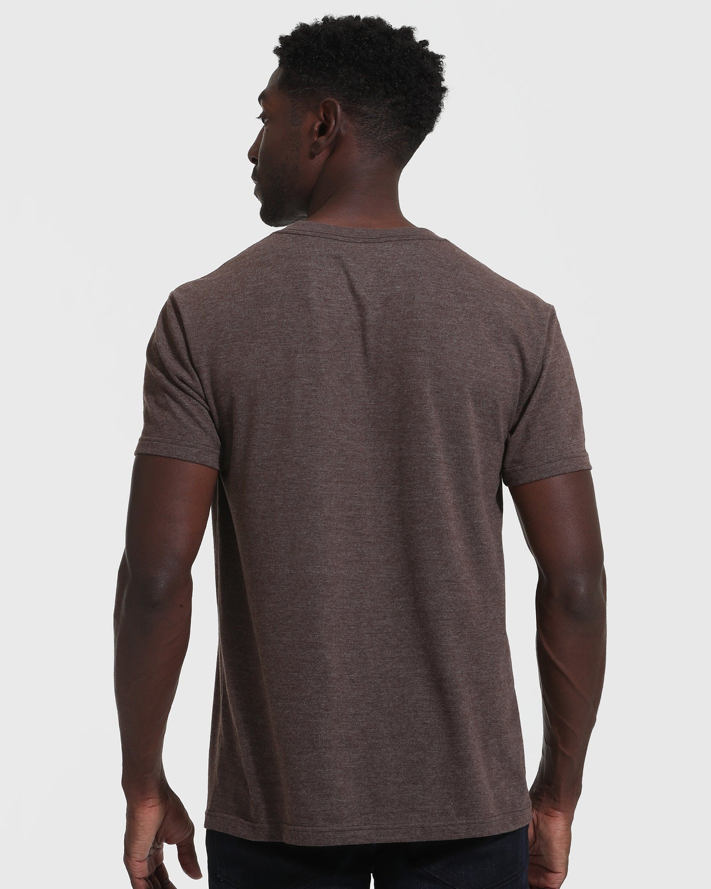 Man wearing Heather Dark Oak Classic V-Neck T-shirt, back view.
