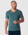 Heather Seafarer Classic V-Neck worn by a man against light-gray backdrop.